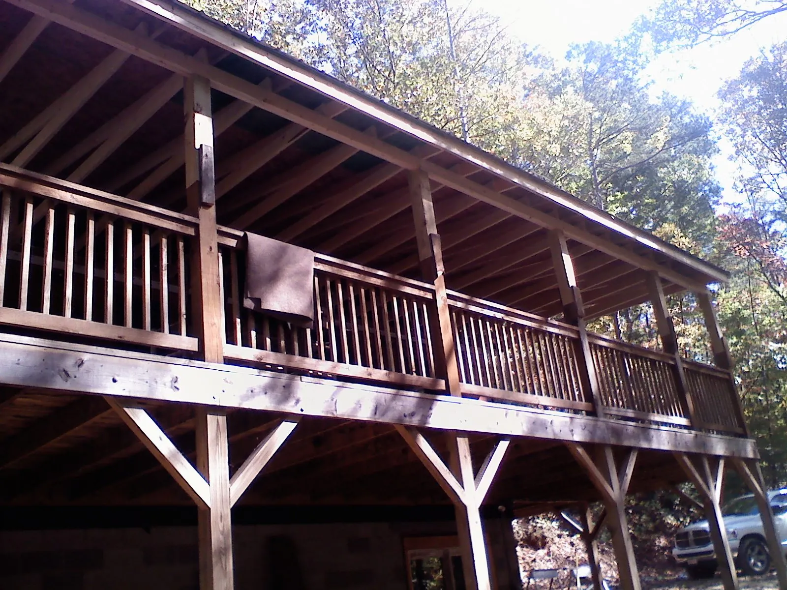 Timber framing under a new elevated porch and deck — Roof Leak Repair in Longbranch by Roofing Brothers